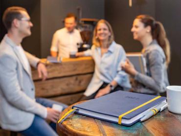 Team macht Pause mit Linescape Wochenkalendern