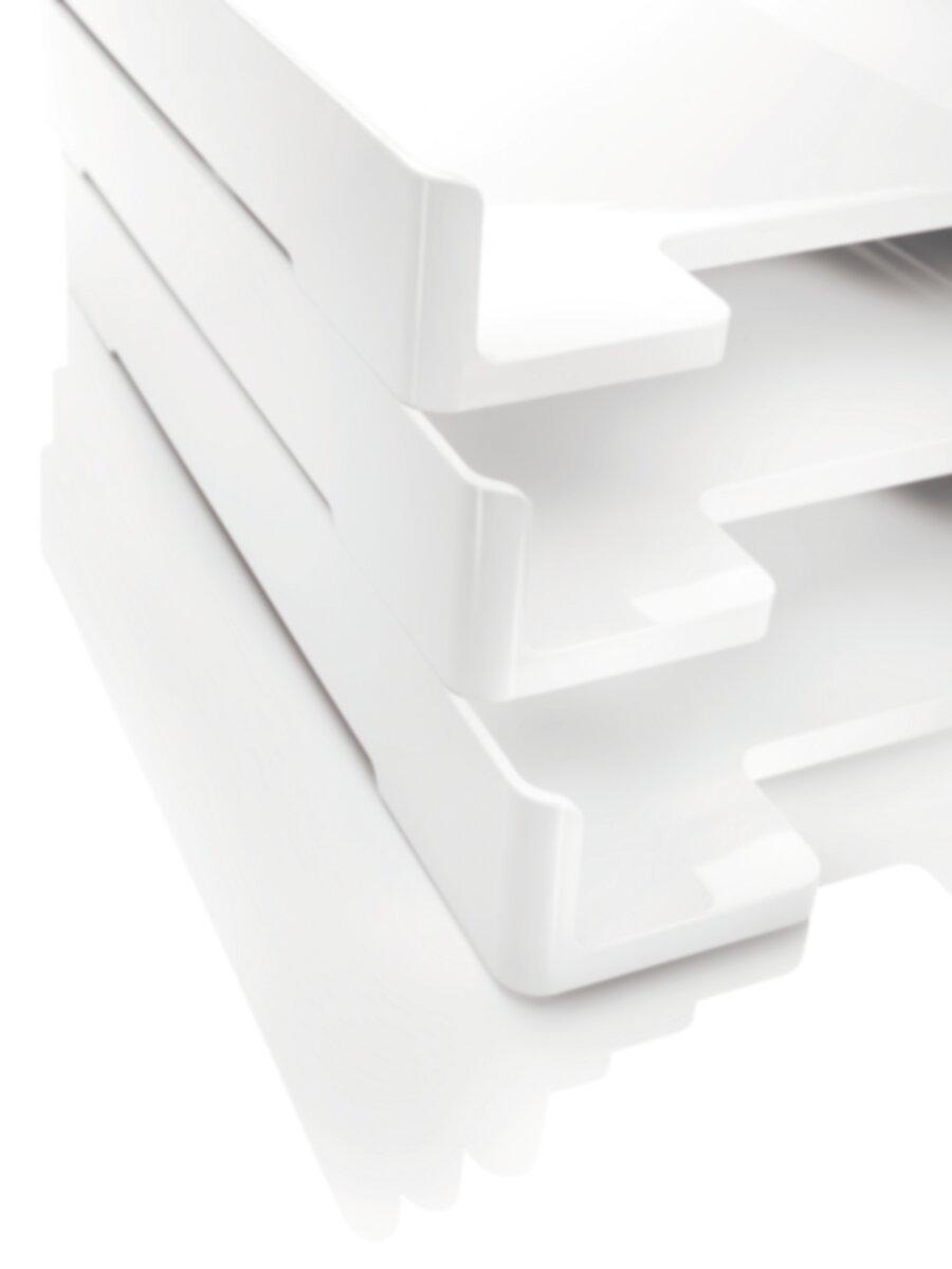 White, stacked plastic trays