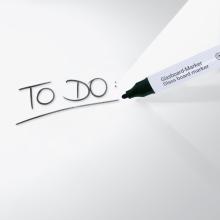 Glass board marker writes 'To Do' on white surface